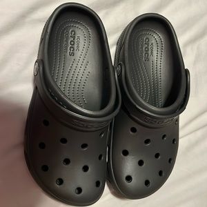 Iconic Crocs. Size 6 Men’s/8 Women’s. Dark grey. New without tags